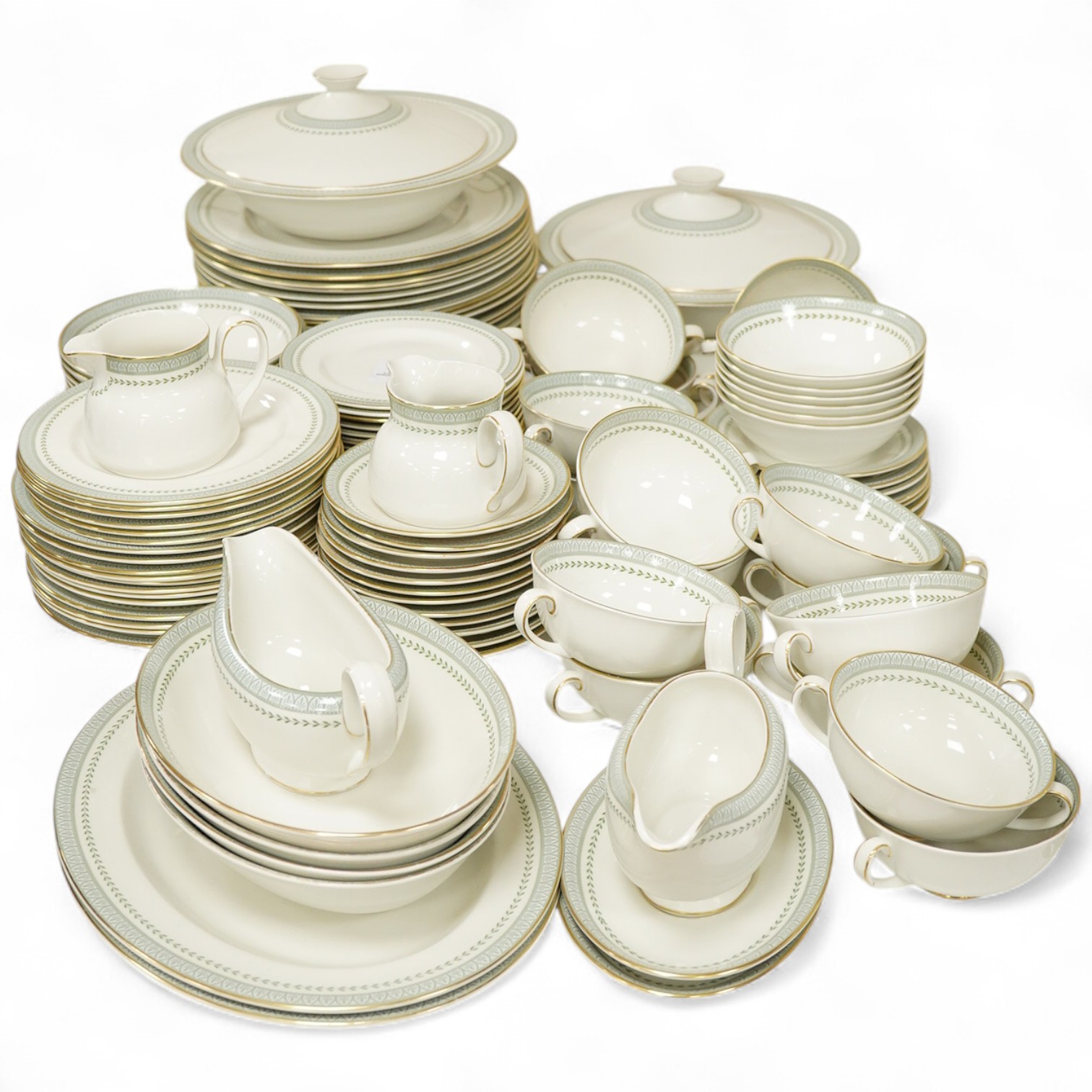 A Royal Doulton Berkshire pattern part dinner service to include tureens, twin handled cups and oval platters, largest 33cm wide. Condition - mostly good